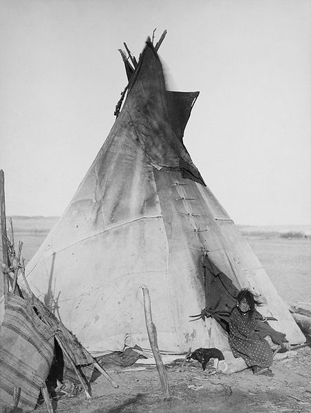 Author: John C.H. Grabill, digital restoration by Michel Vuijlsteke via Wikipedia Commons Oglala girl in front of a tipi